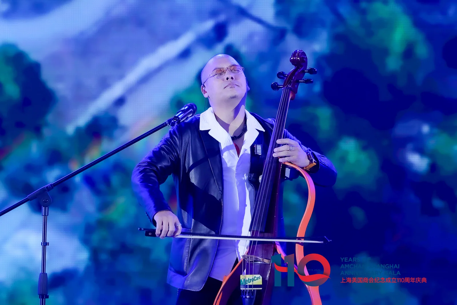 Dana Leong playing electric cello at the AmCham Shanghai anniversary gala