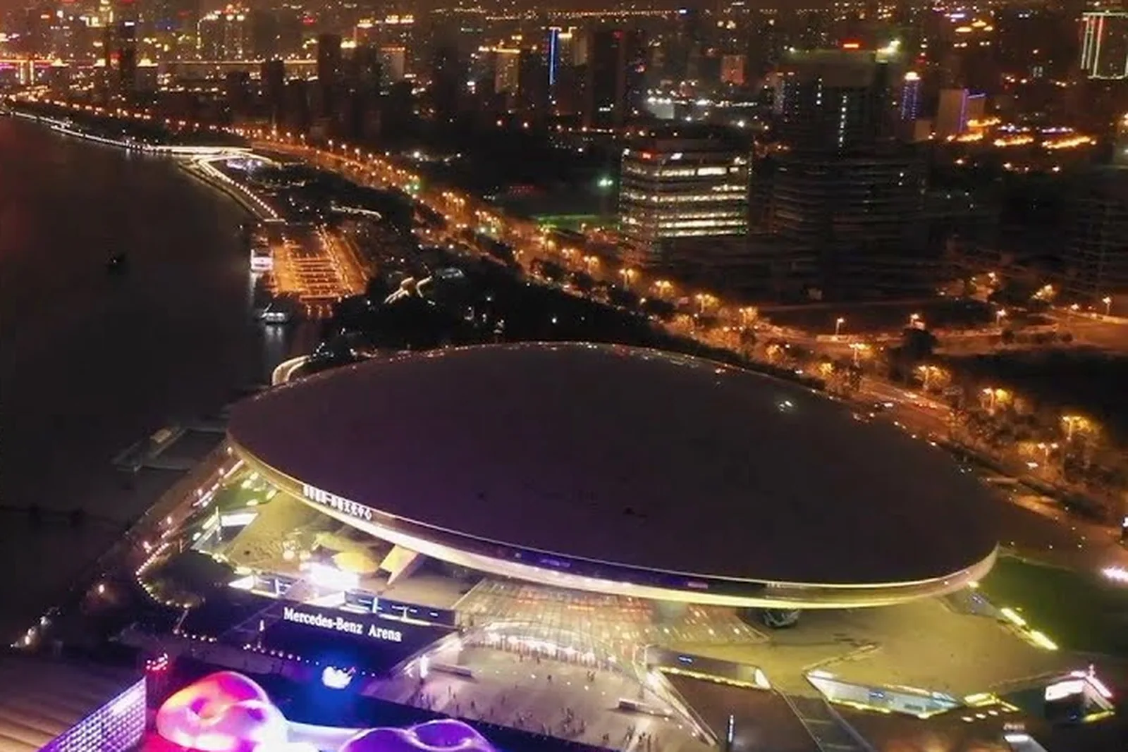 The Mercedes-Benz Arena in Shanghai at night for the ArcFox brand reveal at Shanghai Auto Week