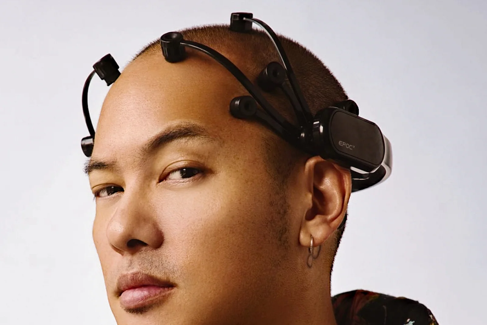 Dana Leong wearing an EMOTIV EEG headset, photographed for Tatler Asia